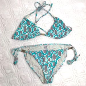 Trina Turk M bikini swimsuit top is a size 8 and bottom is a 10